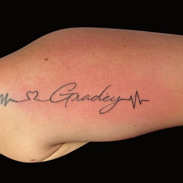 Fine Line Script Tattoo