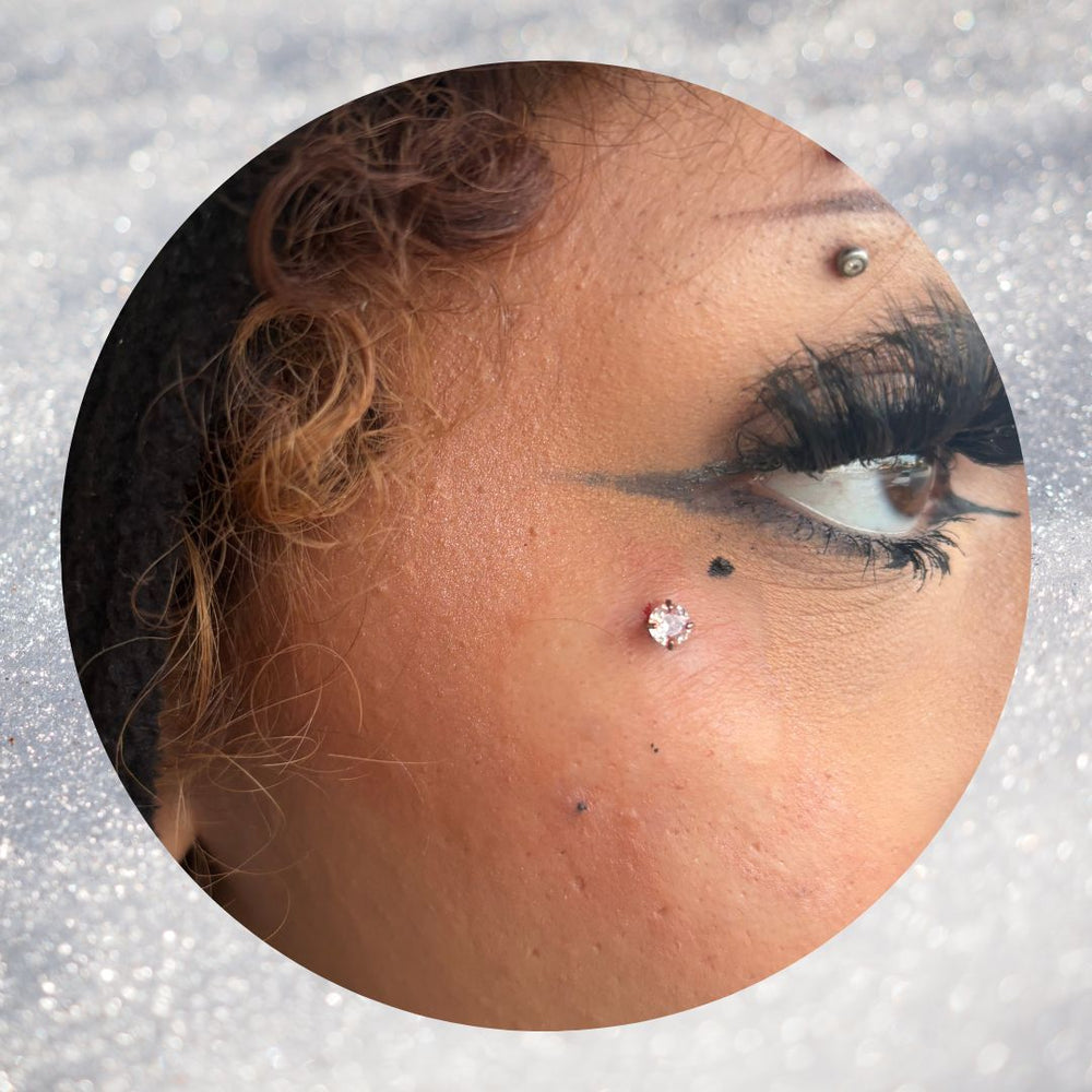 crystal face dermal piercing Mr.Inkwells Tattoo and Piercing Shop Oc's Best