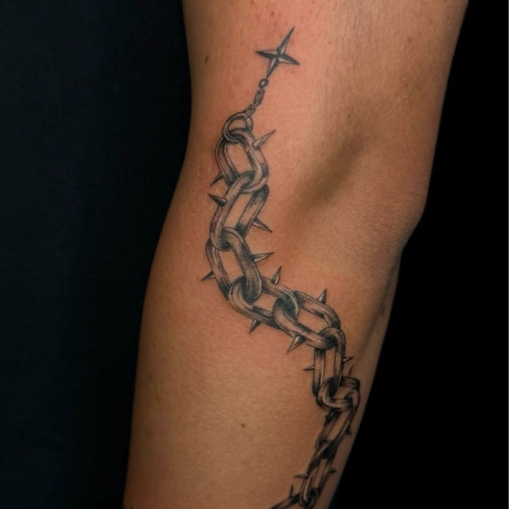 Black and Grey Spiked Chain Tattoo