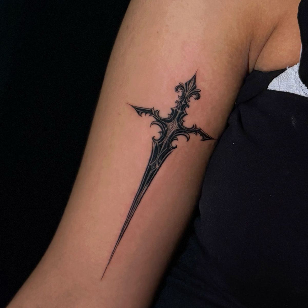 Black work Dagger Tattoo