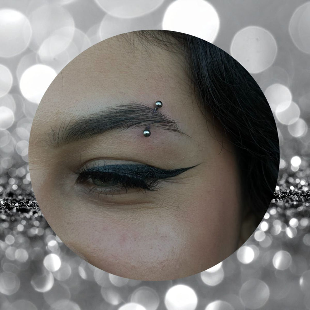 Eyebrow Piercing Service Mr. Inkwells tattoo and Piercing
