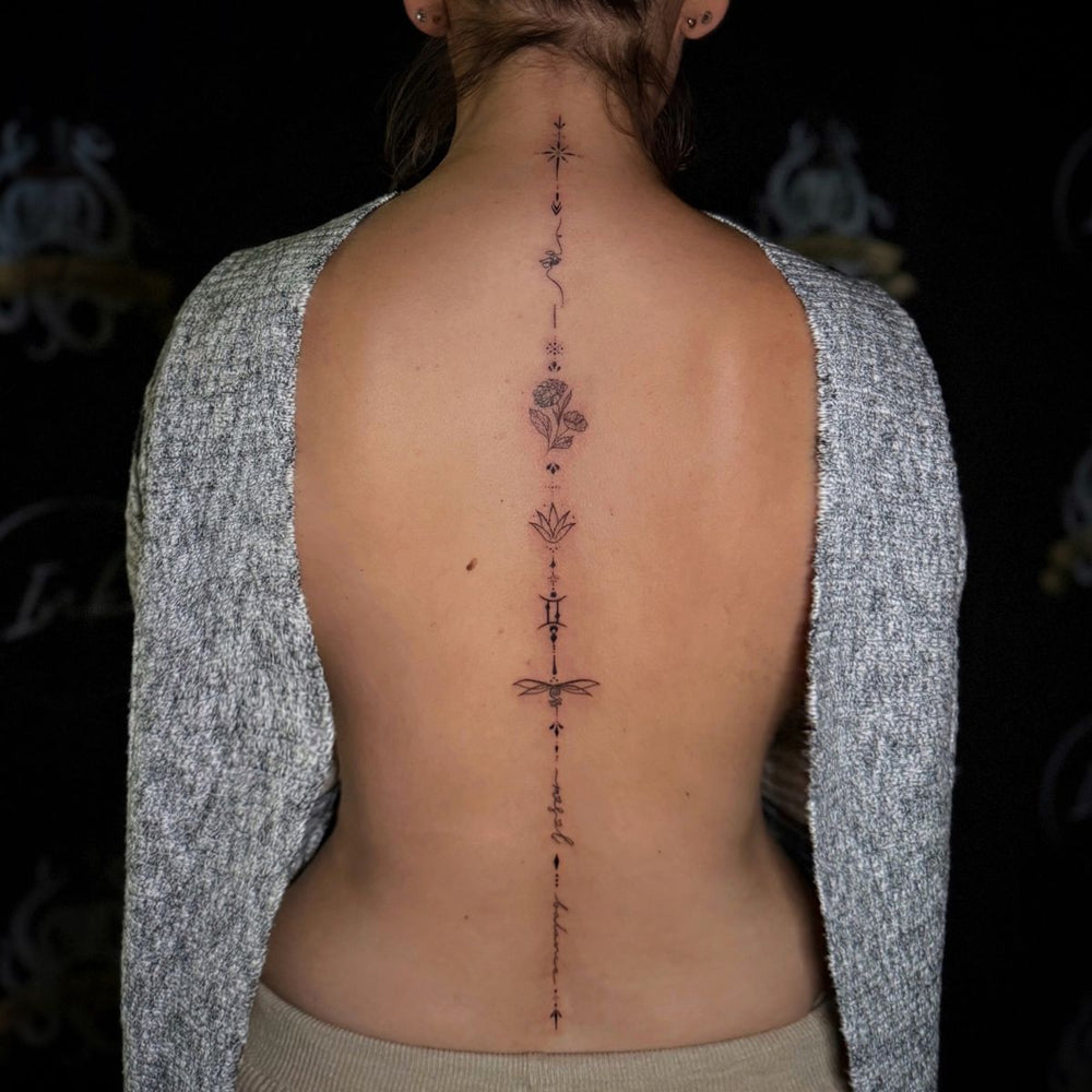 Fine line Spine Tattoo