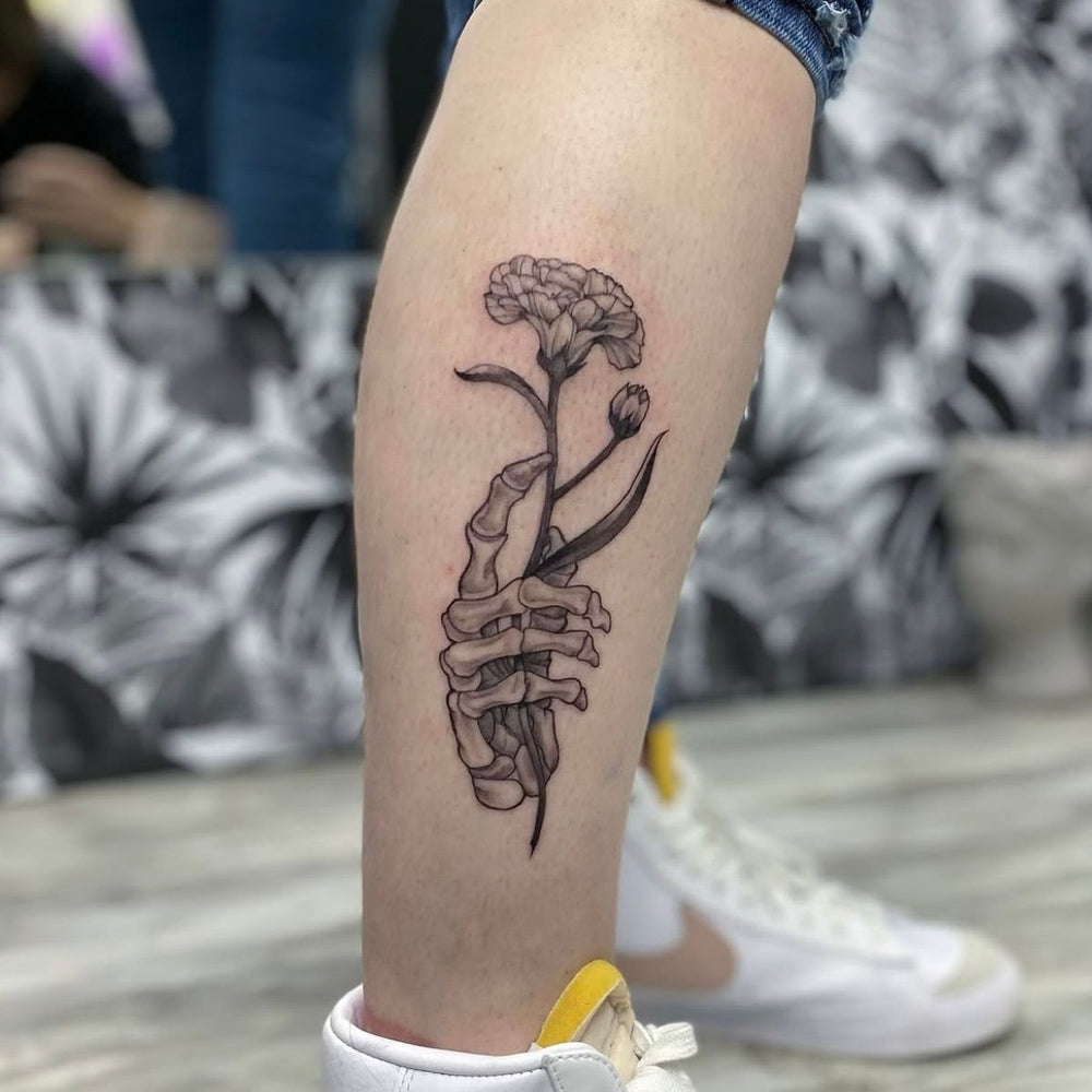 Skeleton Hand and Flower Tattoo