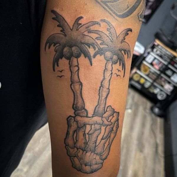 Traditional Skeleton Hand with Plam Trees Tattoo Georgie Tattoo Artist Mr. Inkwells