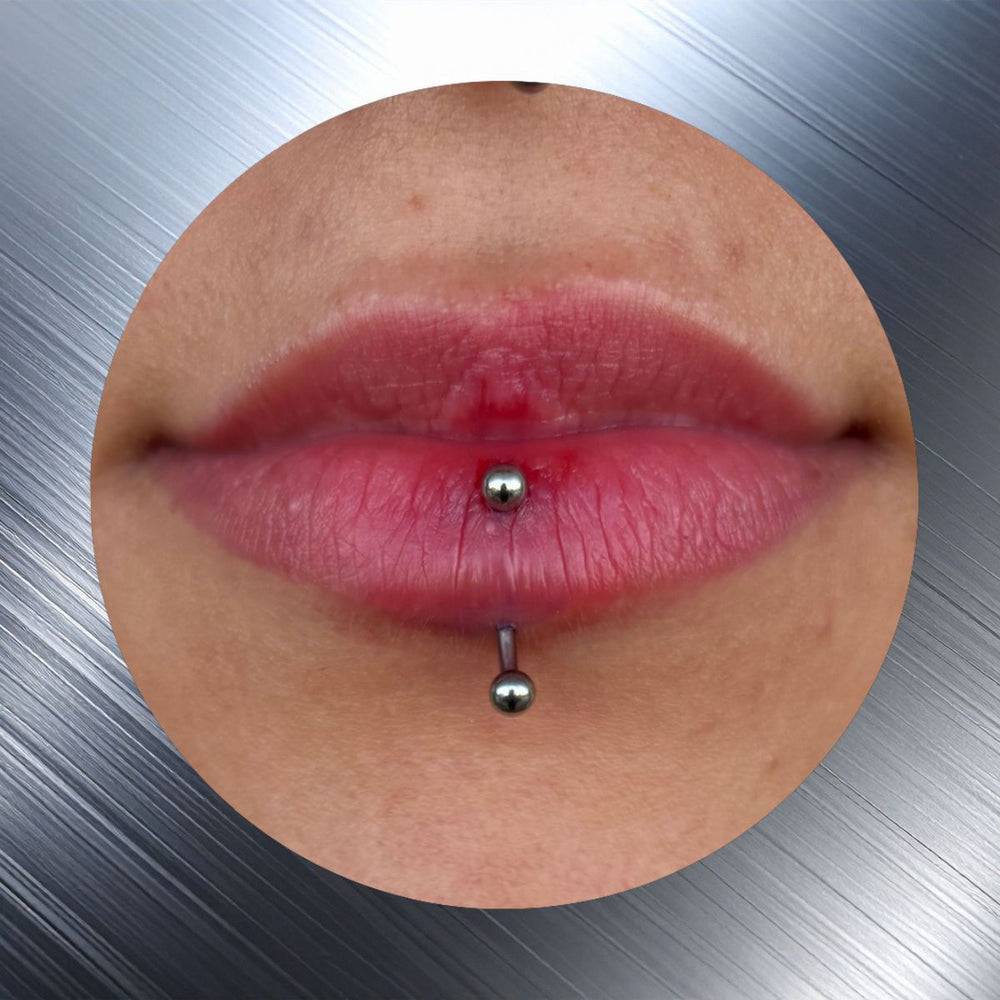 Vertical Labret Piercing Mr.Inkwells Tattoo and Piercing Shop Oc's Best