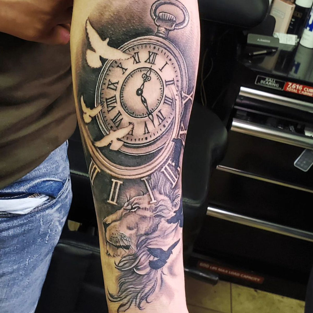 Watch and Lion Tattoo