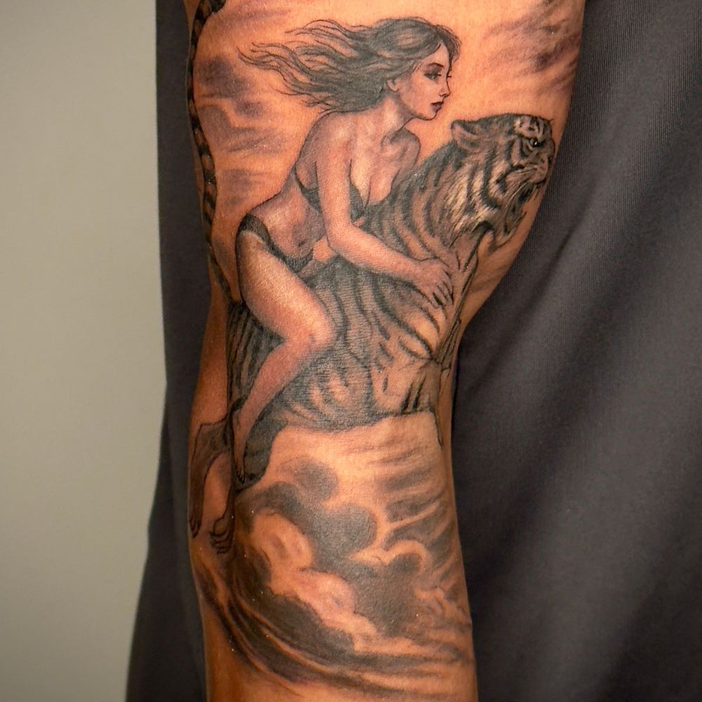 Woman Riding Tiger Tattoo